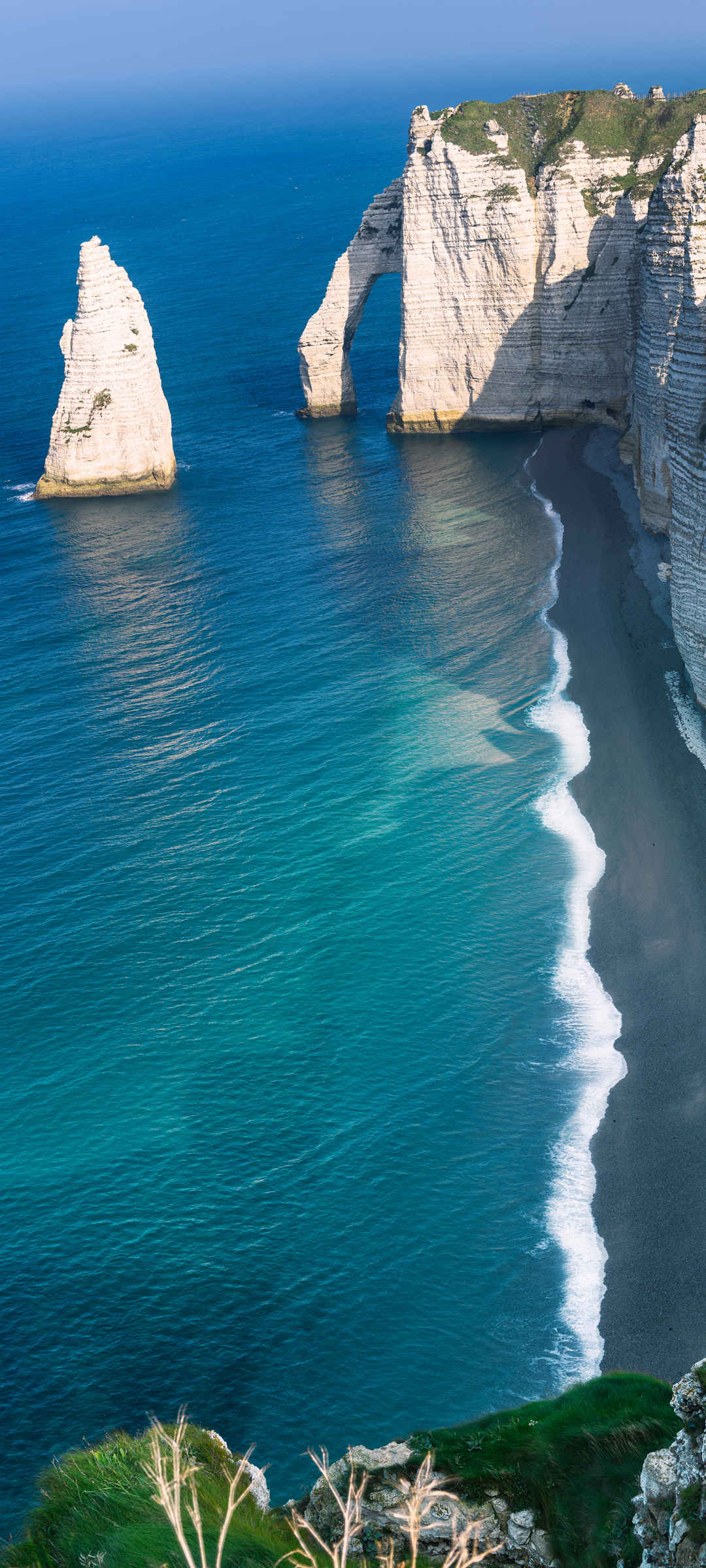 海边 岩石 蓝色大海壁纸手机图片大全